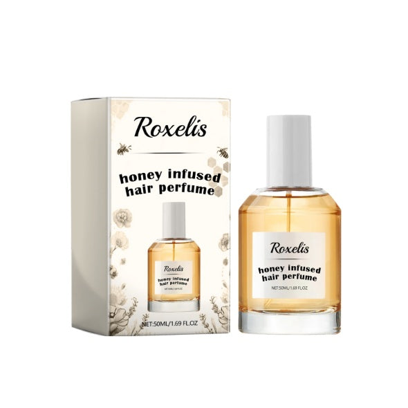 Roxelis honey infused hair perfume bottle and packaging on a white background