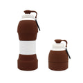Two brown and white collapsible bottles