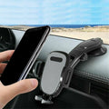 Phone holder on car dashboard with ocean view