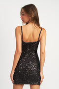 Black sequin dress worn by a model 