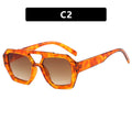 Orange tortoiseshell sunglasses with a gradient lens 