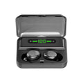 Black wireless earbuds in a charging case with a digital display