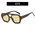 Sunglasses with a brown frame and yellow lenses 