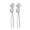 Pair of silver star-shaped earrings with dangling chains