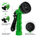 Green and black adjustable garden hose spray nozzle with detailed features
