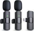 Two wireless microphones with a receiver