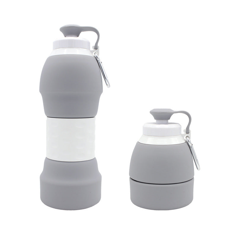 Two gray and white collapsible water bottles