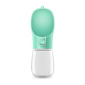 Portable pet water bottle with a green top 