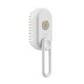 White grooming tool with bristles