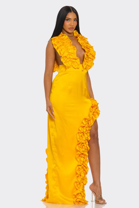 Back view of yellow ruffle gown with flowing hem