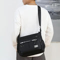 Large-Capacity Waterproof Men’s Backpack – Business Casual Multi-Pocket Messenger & Shoulder Bag