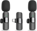 Two black microphones with a central connector