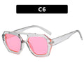 Sunglasses with pink lenses and clear frame 