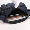 Navy blue bag with a white glove opening it