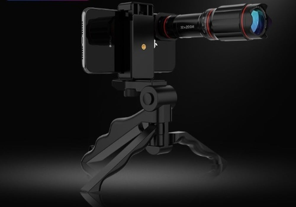 Phone camera with lens attachment on a stand