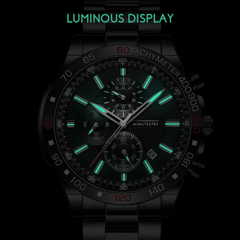 Black watch with luminous display on a dark background