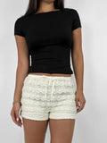 feminine lace overlay shorts with bow and elastic waist