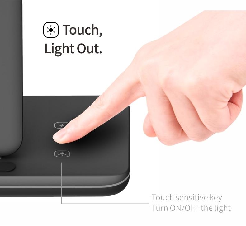 Hand touching a touch-sensitive key on a device with text 'Touch, Light Out.'